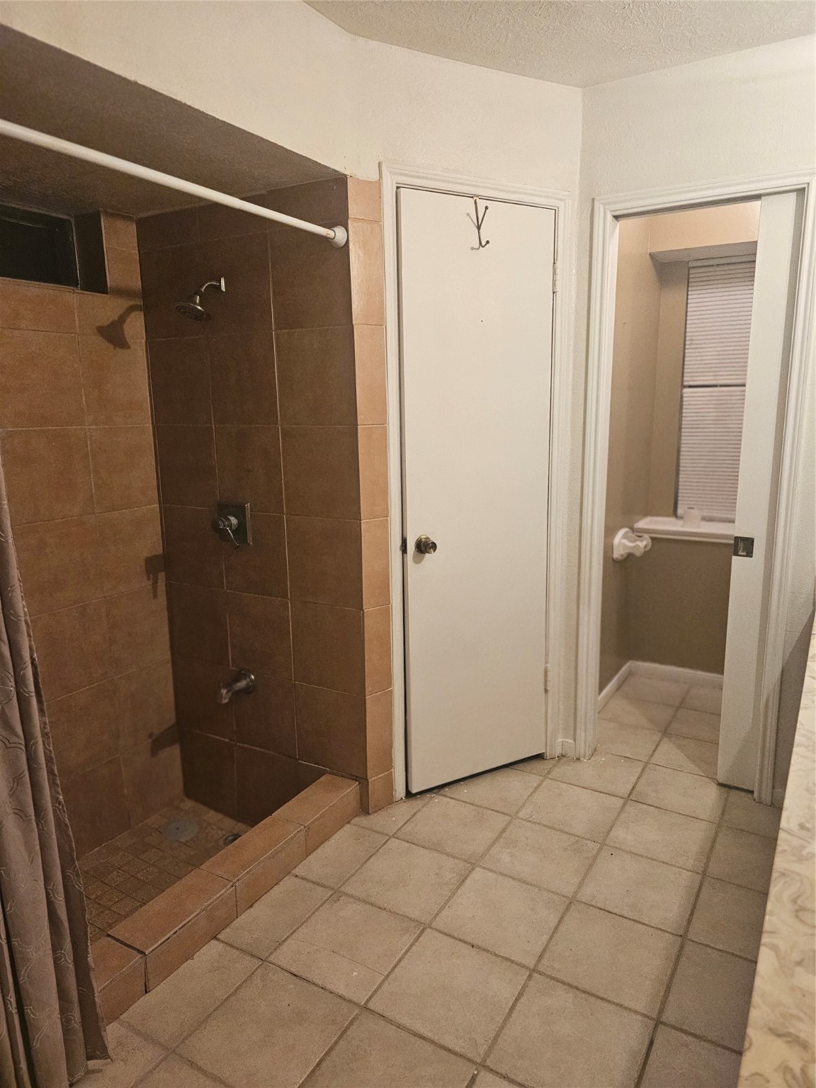 4011 Alshire Drive Spring, TX 77373 - Photo 18 of 34 a bathroom with a shower and a sink