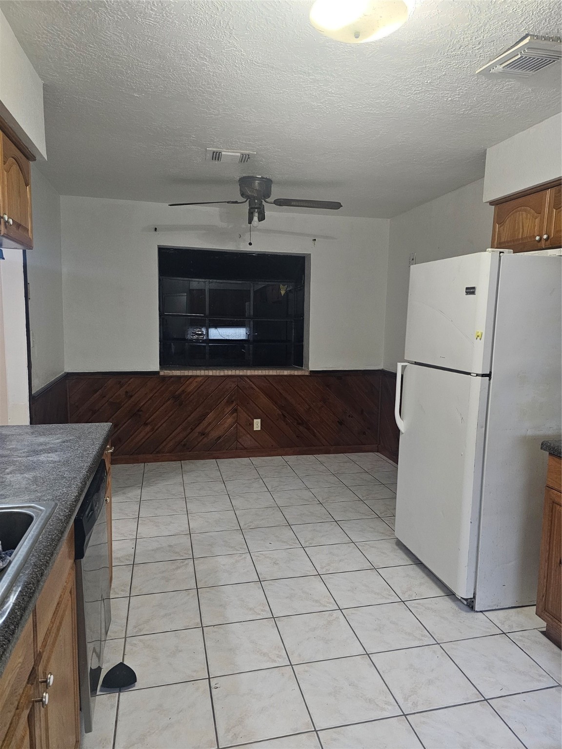 4011 Alshire Drive Spring, TX 77373 - Photo 34 of 34 a kitchen with a sink and a refrigerator