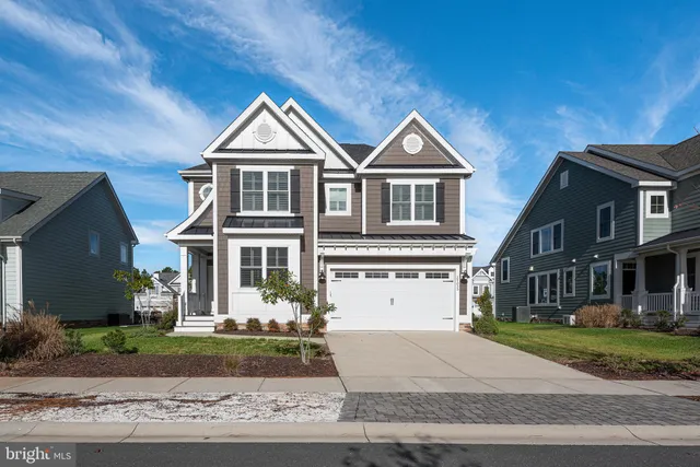a view of room with window and hardwood floor