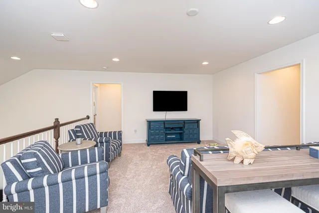 an aerial view of residential house with outdoor space and swimming pool