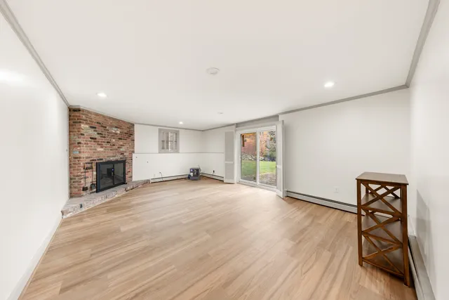 a view of livingroom with furniture and fireplace