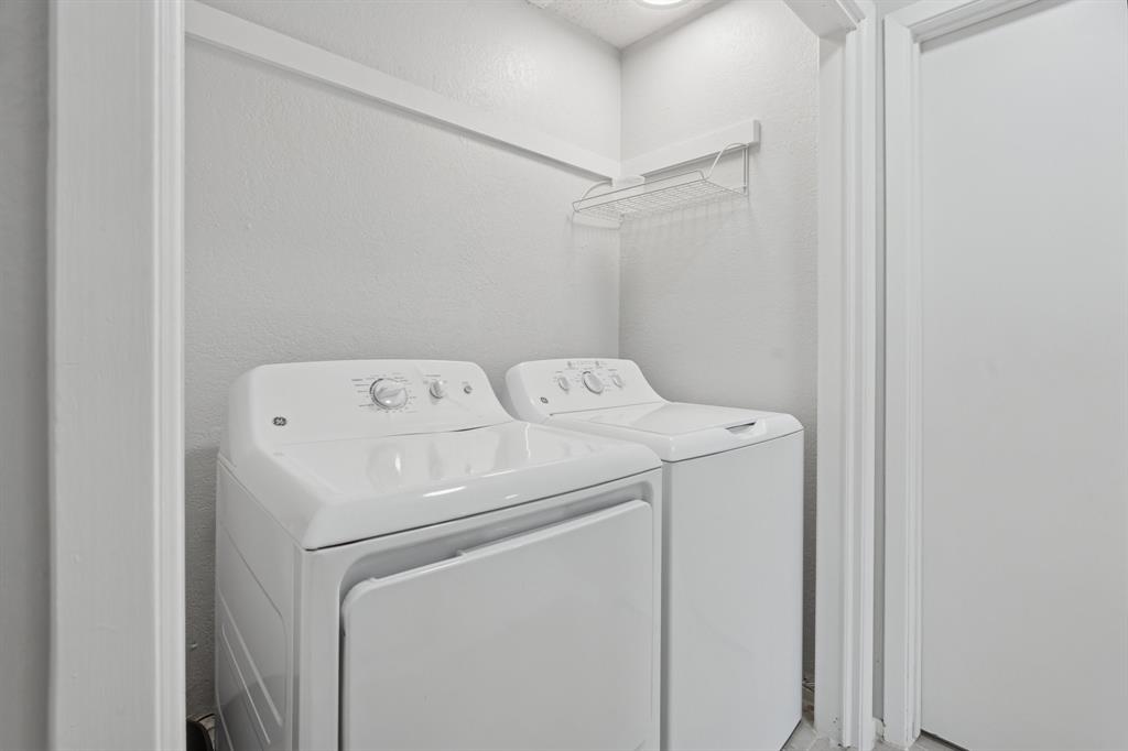 9780 Windy Ridge Road Frisco, TX 75033 - Photo 18 of 25 Dedicated laundry area with a full-size washer and dryer