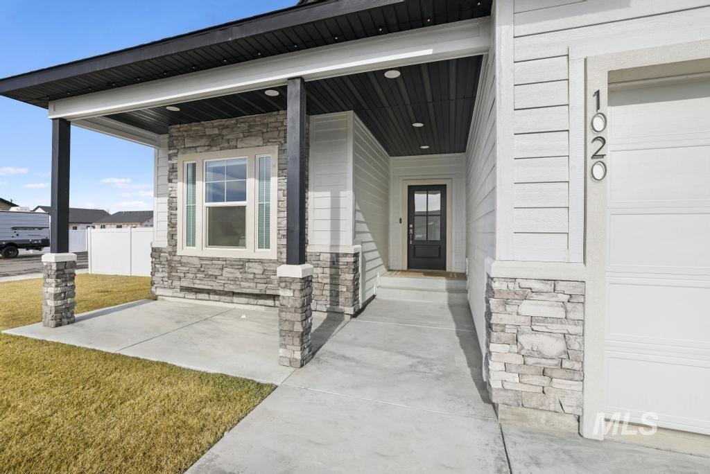 1020 13th Street Rupert, ID 83350 - Photo 5 of 30 Entrance to property featuring stone siding and a porch