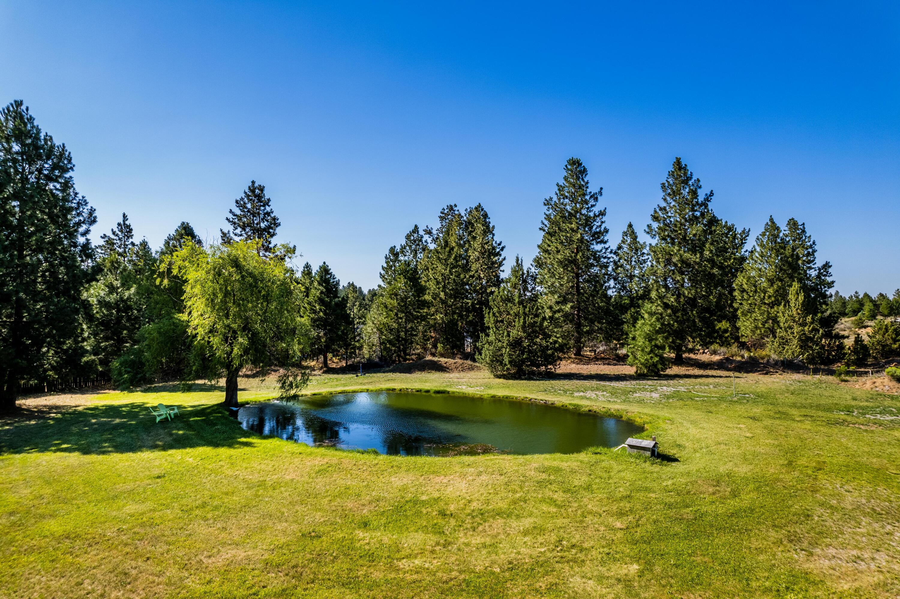 19238 Baker Road Bend, OR 97702 - Photo 60 of 64 View of Beautiful Pond with 2 acres of Arnold Irrigation Rights