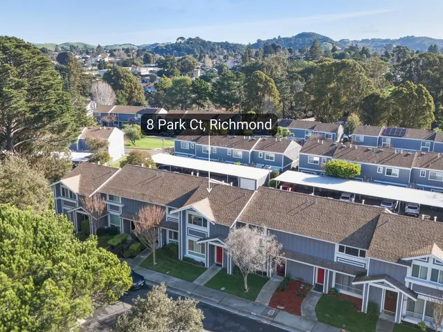 a dining room with a table and chairs
