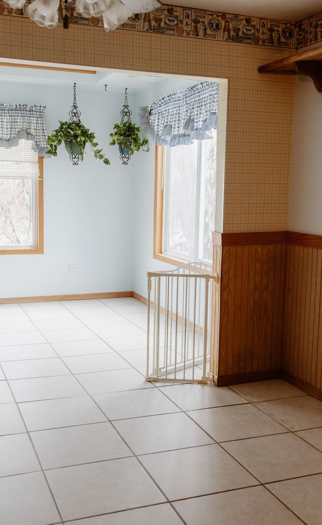 107 Arcadia Avenue Romeoville, IL 60446 - Photo 12 of 51 an empty room with wooden floor and a window