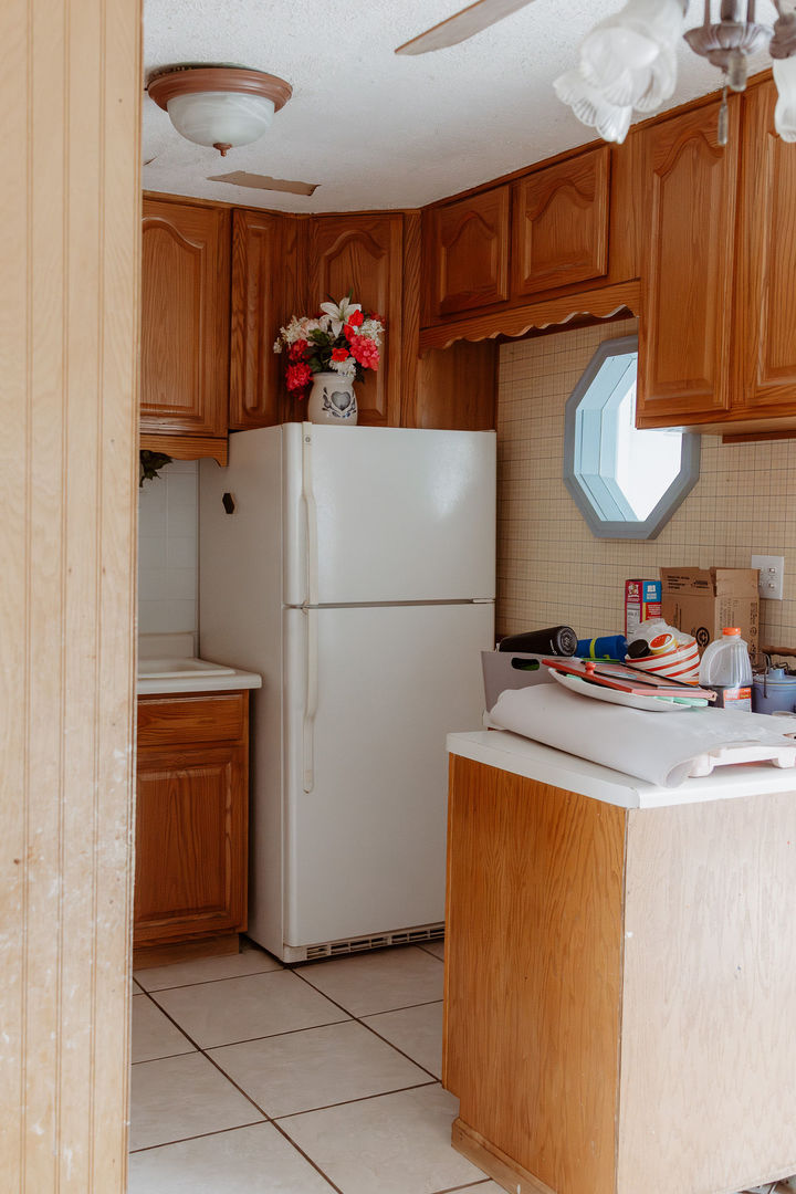 107 Arcadia Avenue Romeoville, IL 60446 - Photo 13 of 51 a kitchen with refrigerator and cabinets