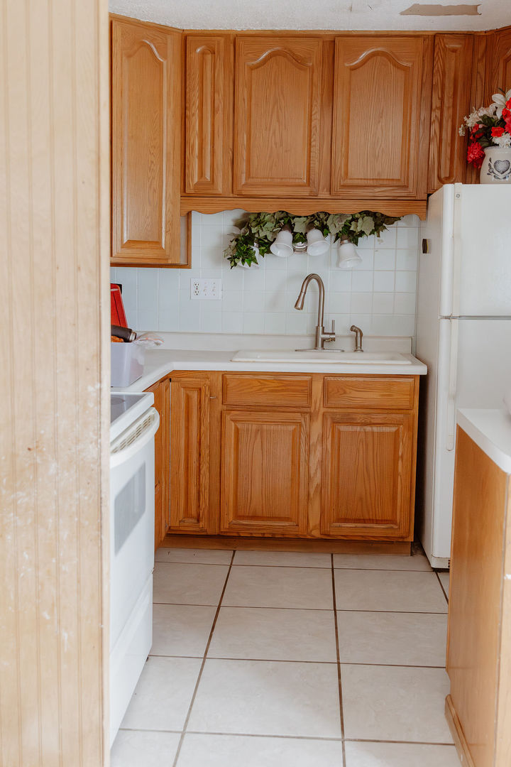 107 Arcadia Avenue Romeoville, IL 60446 - Photo 15 of 51 a view of a kitchen with a sink