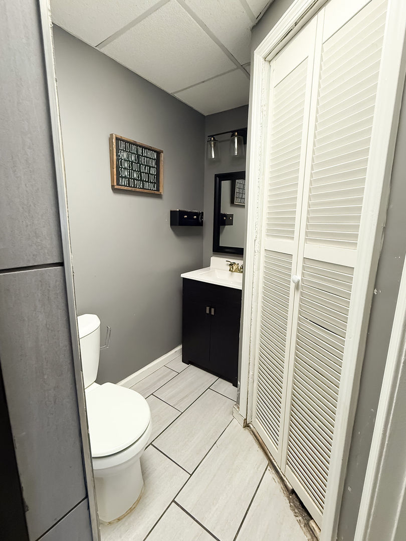 107 Arcadia Avenue Romeoville, IL 60446 - Photo 18 of 51 a bathroom with a toilet and a shower