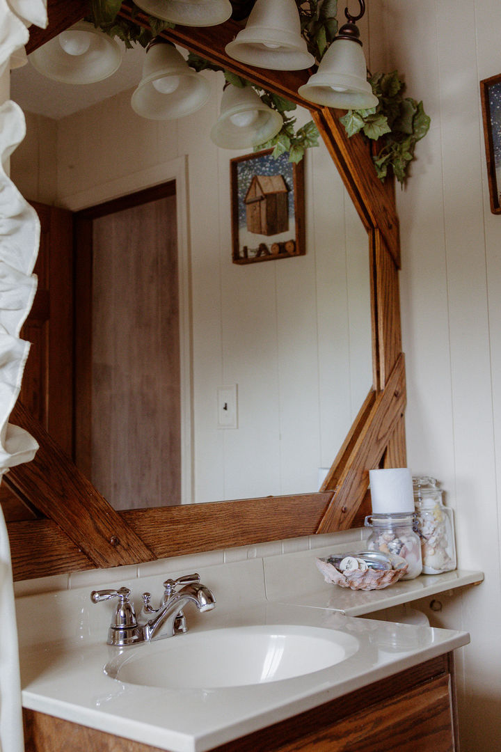 107 Arcadia Avenue Romeoville, IL 60446 - Photo 34 of 51 a bathroom with a sink and a mirror