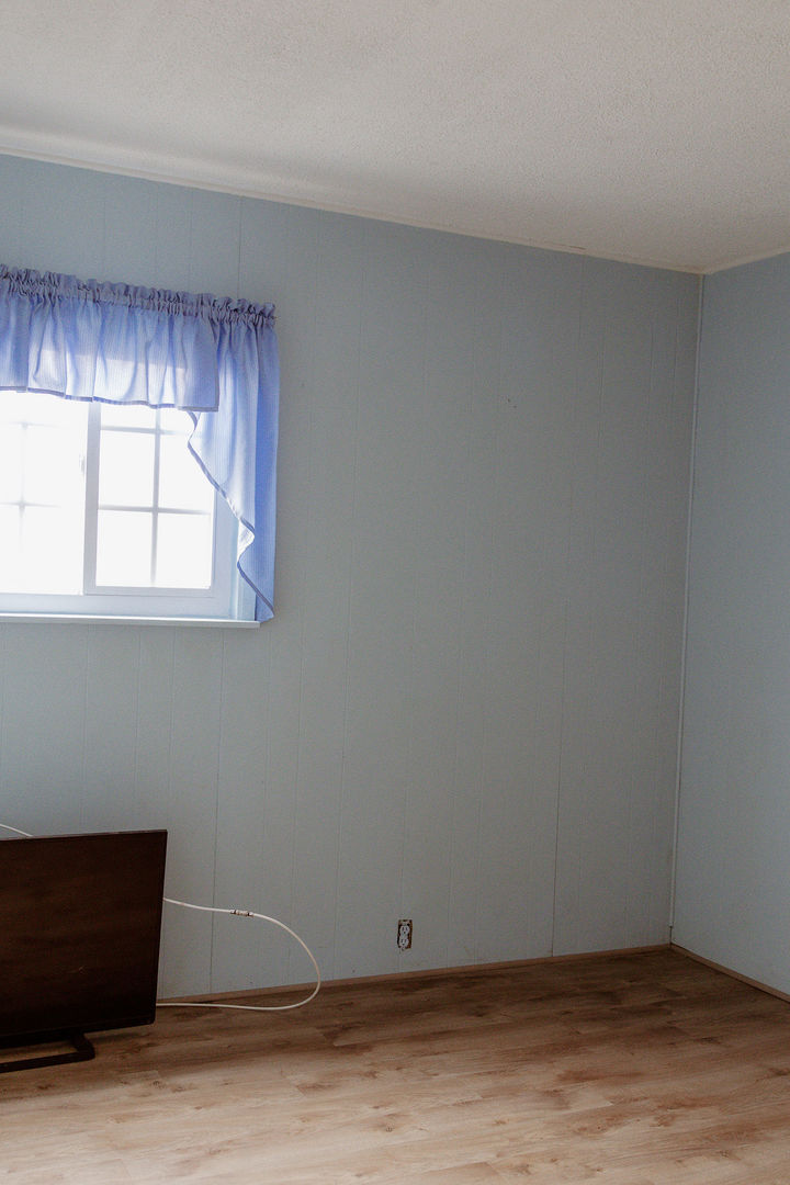 107 Arcadia Avenue Romeoville, IL 60446 - Photo 35 of 51 a view of an empty room with wooden floor and a window