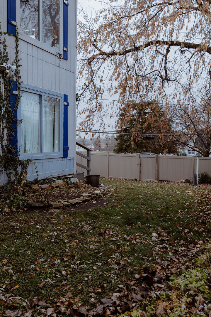107 Arcadia Avenue Romeoville, IL 60446 - Photo 42 of 51 a backyard of a house with lots of green space