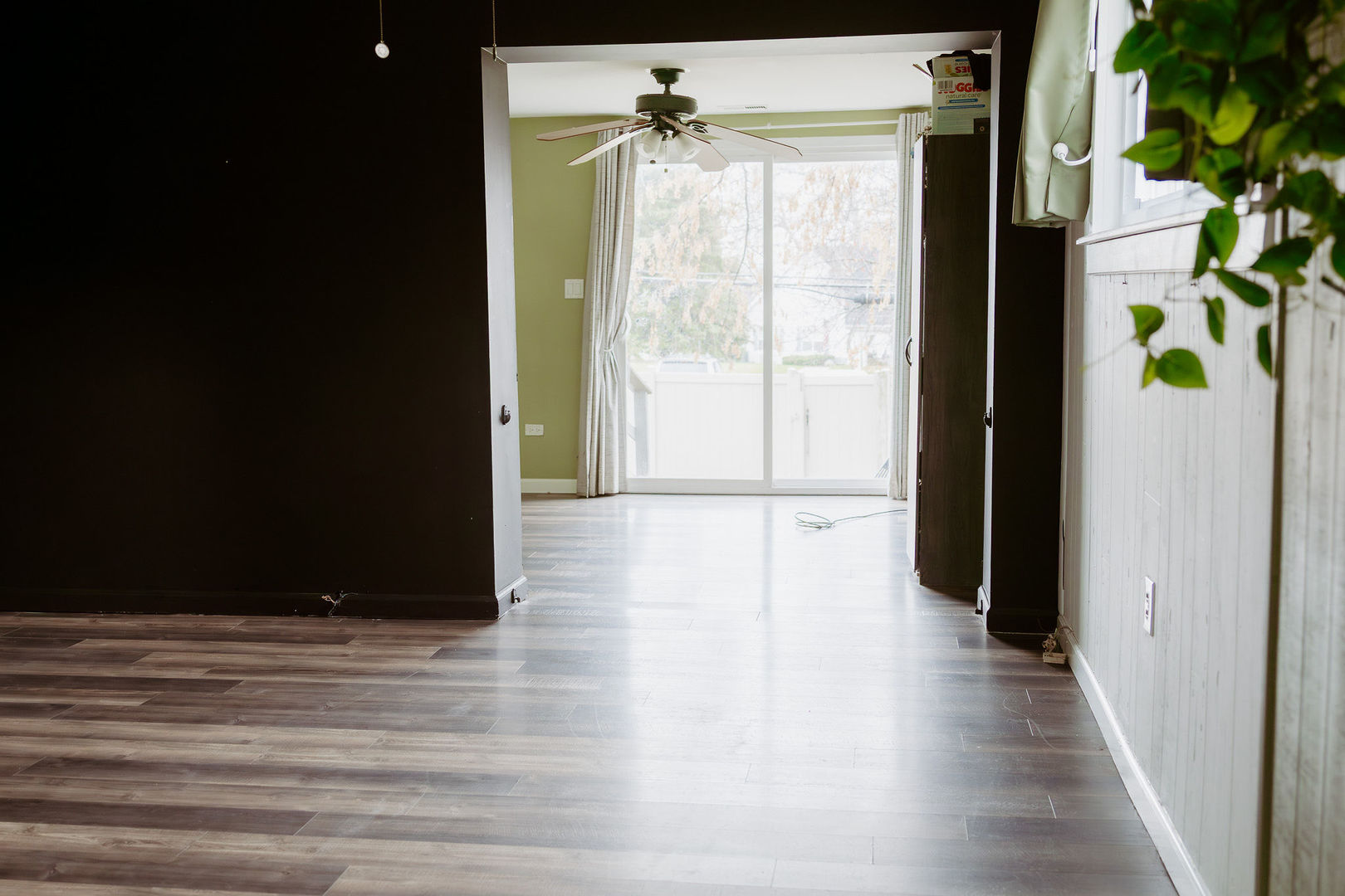 107 Arcadia Avenue Romeoville, IL 60446 - Photo 6 of 51 a view of a hallway with wooden floor and a entryway