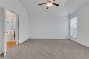 13117 Larks View Point Fort Worth, TX 76244 - Photo 17 of 26 an empty room with chandelier fan