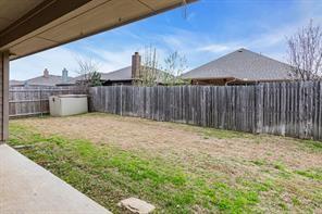 13117 Larks View Point Fort Worth, TX 76244 - Photo 22 of 26 a view of a backyard