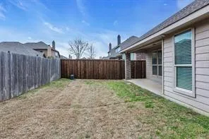 a house view with a backyard space