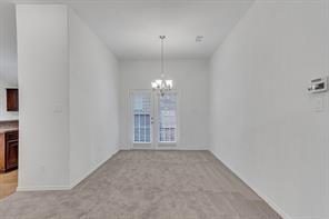 13117 Larks View Point Fort Worth, TX 76244 - Photo 3 of 26 a view of an empty room with a window