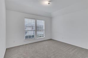 13117 Larks View Point Fort Worth, TX 76244 - Photo 9 of 26 an empty room with windows