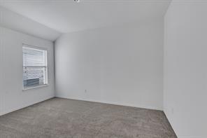 13117 Larks View Point Fort Worth, TX 76244 - Photo 10 of 26 a view of an empty room and a window