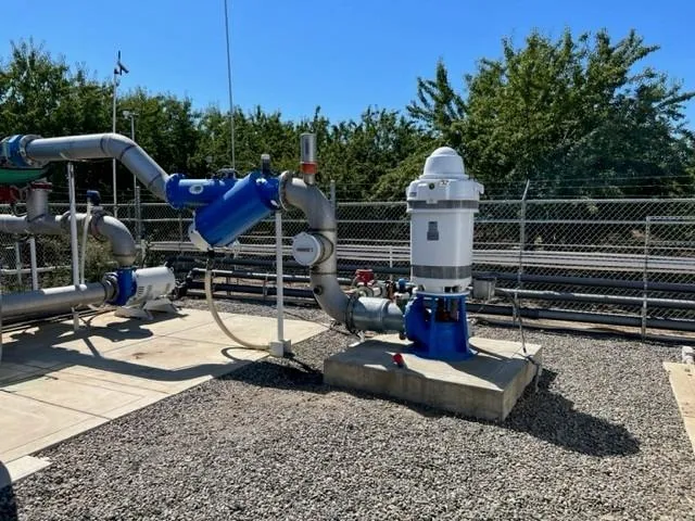 a view of a yard covered with snow in front of house