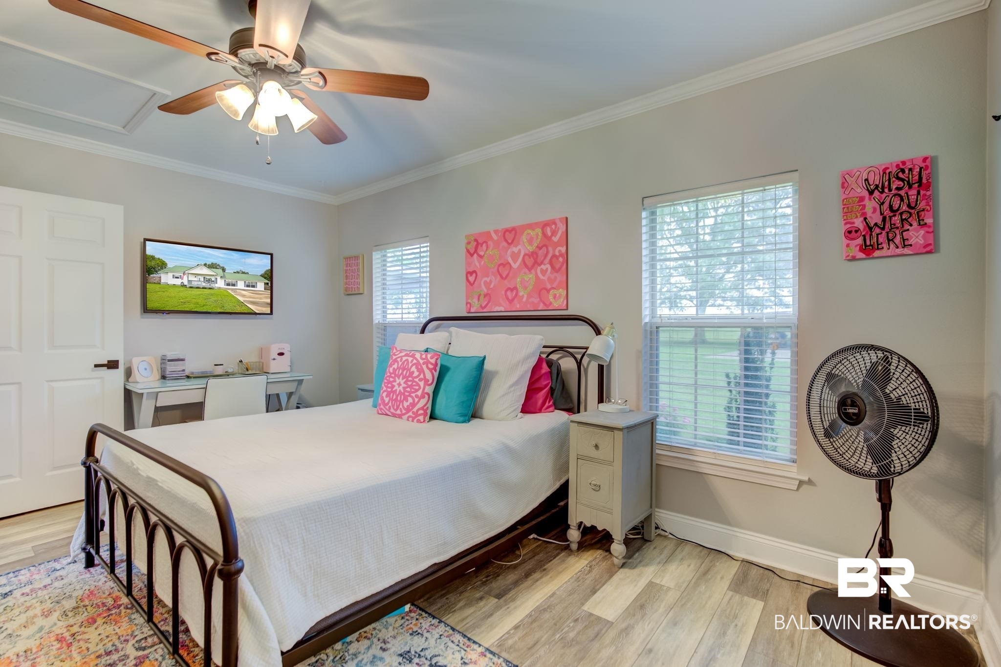 18732 Fairground Road Robertsdale, AL 36567 - Photo 28 of 46 Bedroom featuring ornamental molding, light hardwood / wood-style flooring, and ceiling fan