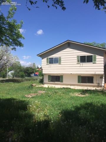 4415 Beaumont Road Colorado Springs, CO 80916 - Photo 5 of 29 Back side view of windows. These windows are on order and shutters to be replaced.