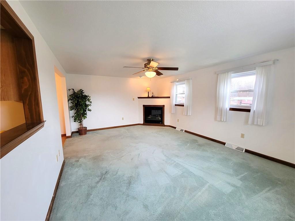 2013 Cutter Drive McKees Rocks, PA 15136 - Photo 12 of 25 a view of a livingroom with a fireplace a window and a fireplace