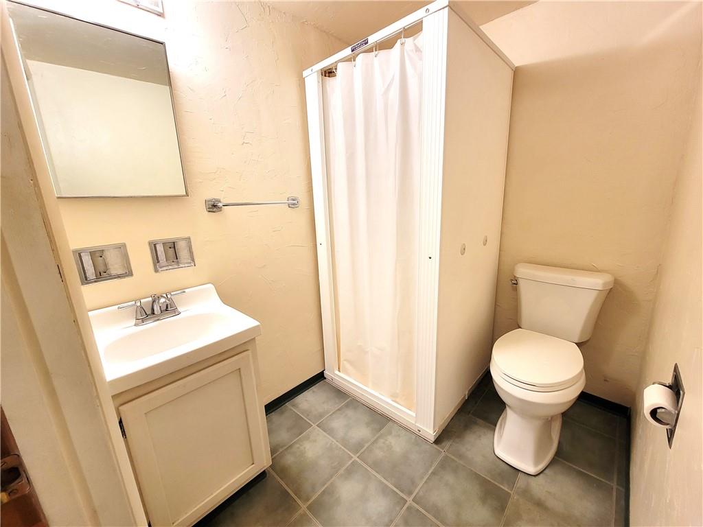 2013 Cutter Drive McKees Rocks, PA 15136 - Photo 22 of 25 a bathroom with a sink toilet and a mirror