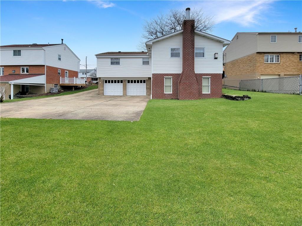 2013 Cutter Drive McKees Rocks, PA 15136 - Photo 24 of 25 a view of a house with a back yard
