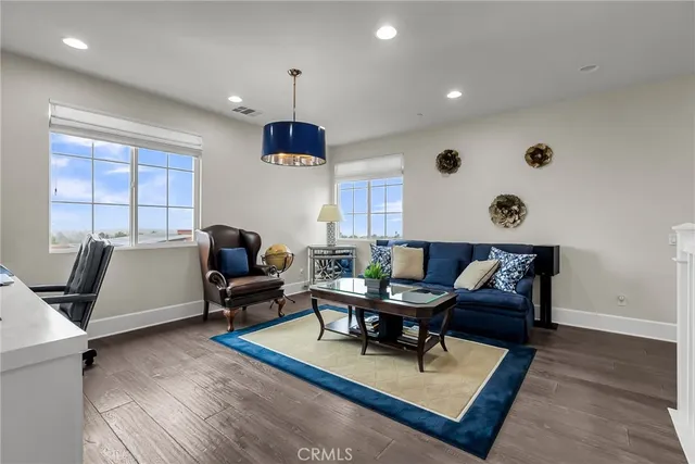 a spacious bathroom with a sink a mirror and a bathtub