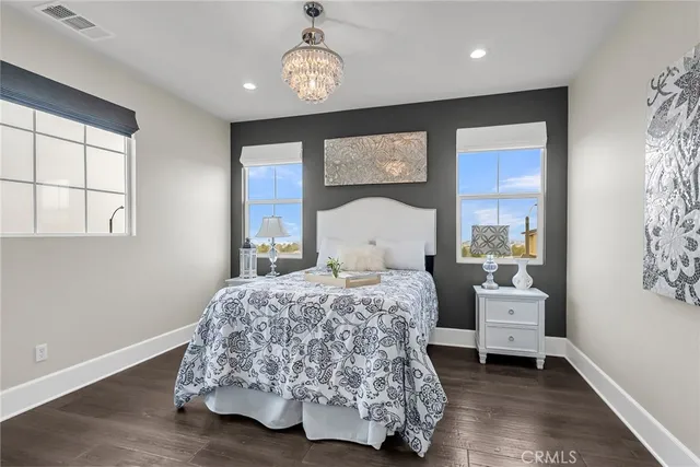 a bathroom with a sink a toilet and shower curtain