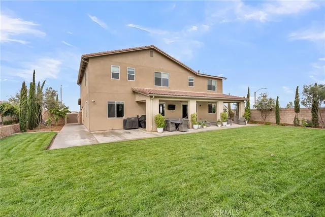 a view of an outdoor space and basketball court
