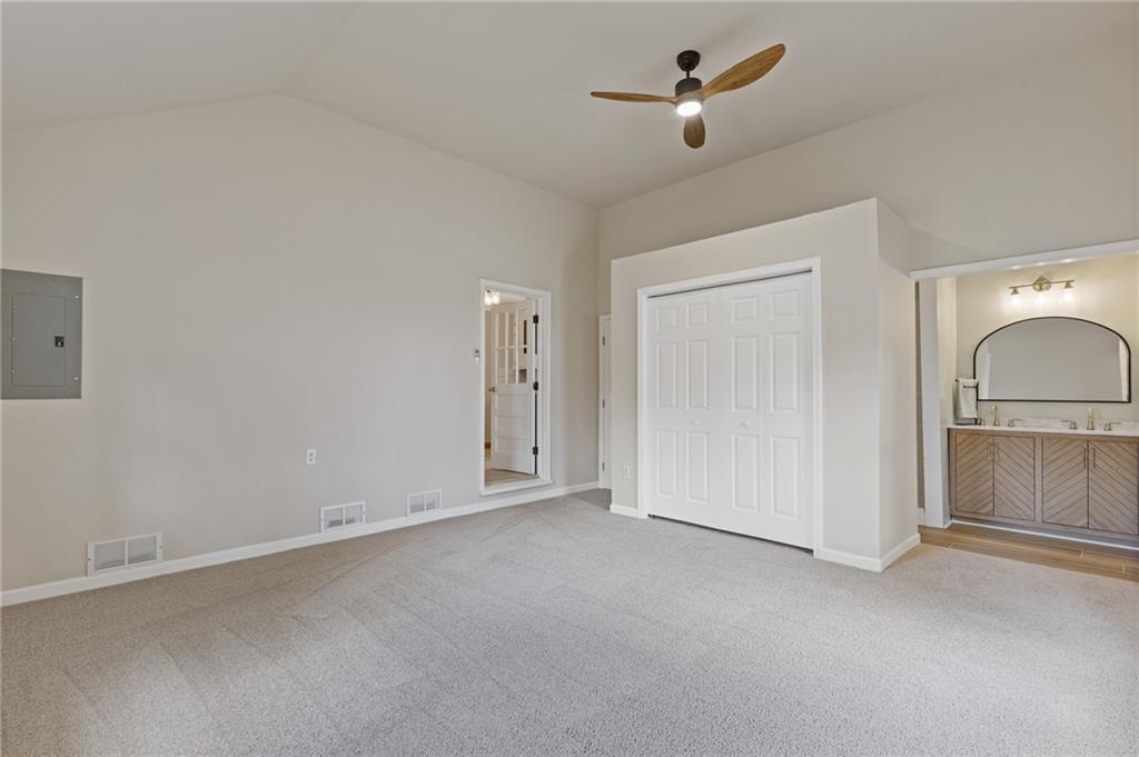 1312 Milstead Avenue Conyers, GA 30012 - Photo 15 of 34 a view of empty room with ceiling fan