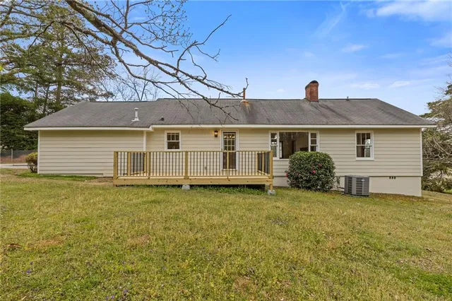 a house with trees in front of it