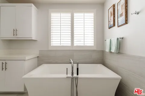 a bathroom with a bathtub