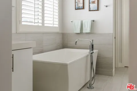 a utility room with a window dryer and washer