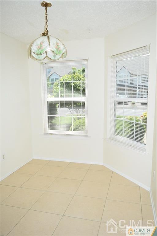 348 Lunar Road Piscataway, NJ 08854 - Photo 3 of 33 a view of an empty room with a window