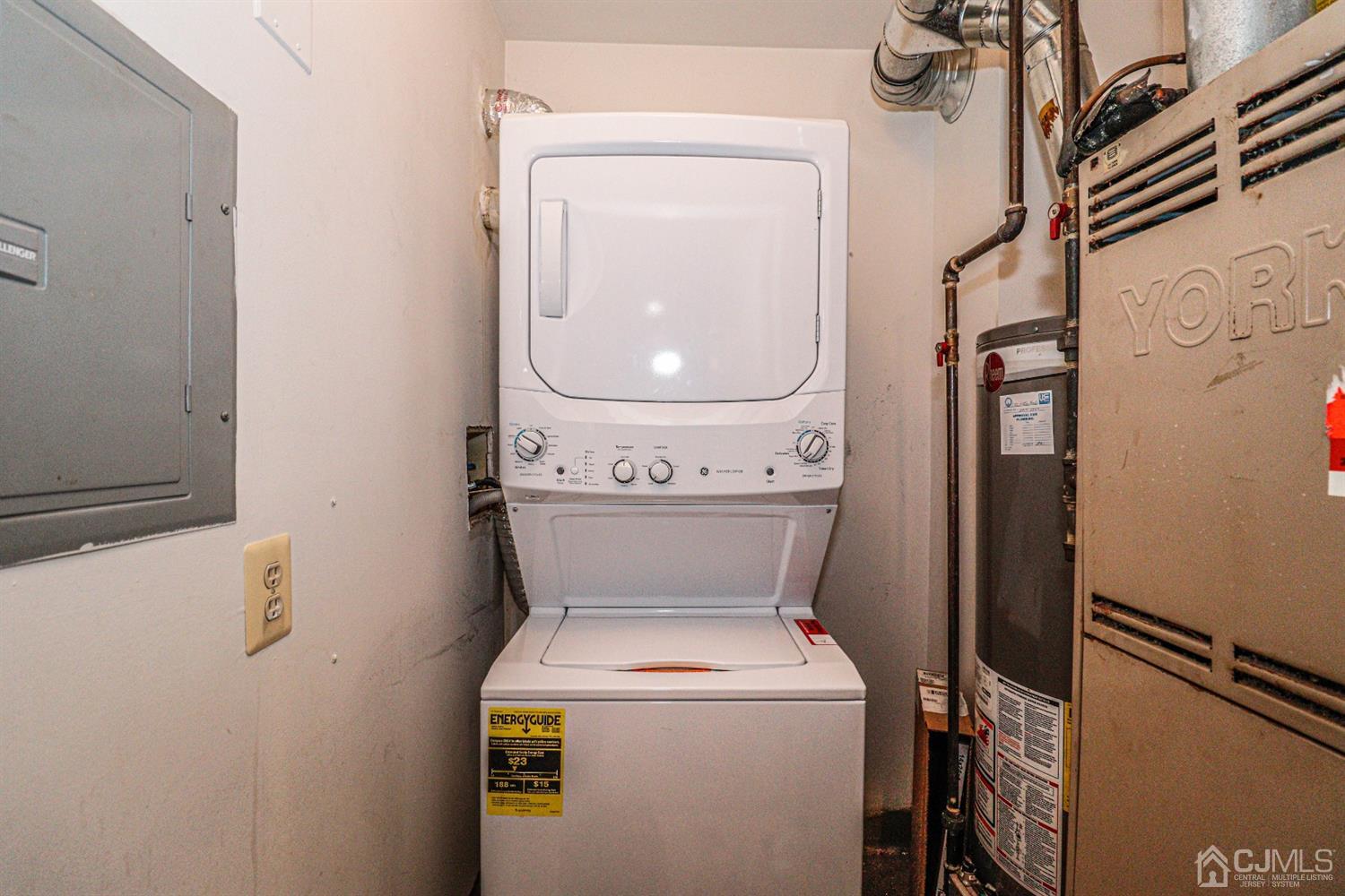 348 Lunar Road Piscataway, NJ 08854 - Photo 25 of 33 a close view of a utility room with dryer and washer