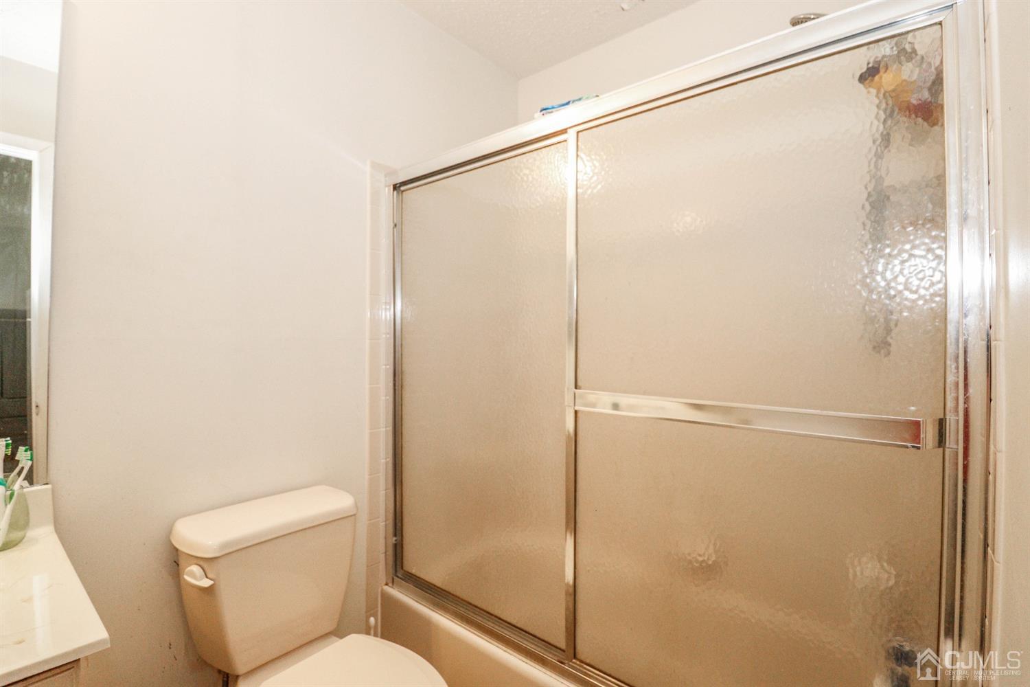 348 Lunar Road Piscataway, NJ 08854 - Photo 26 of 33 a bathroom with a shower and a toilet