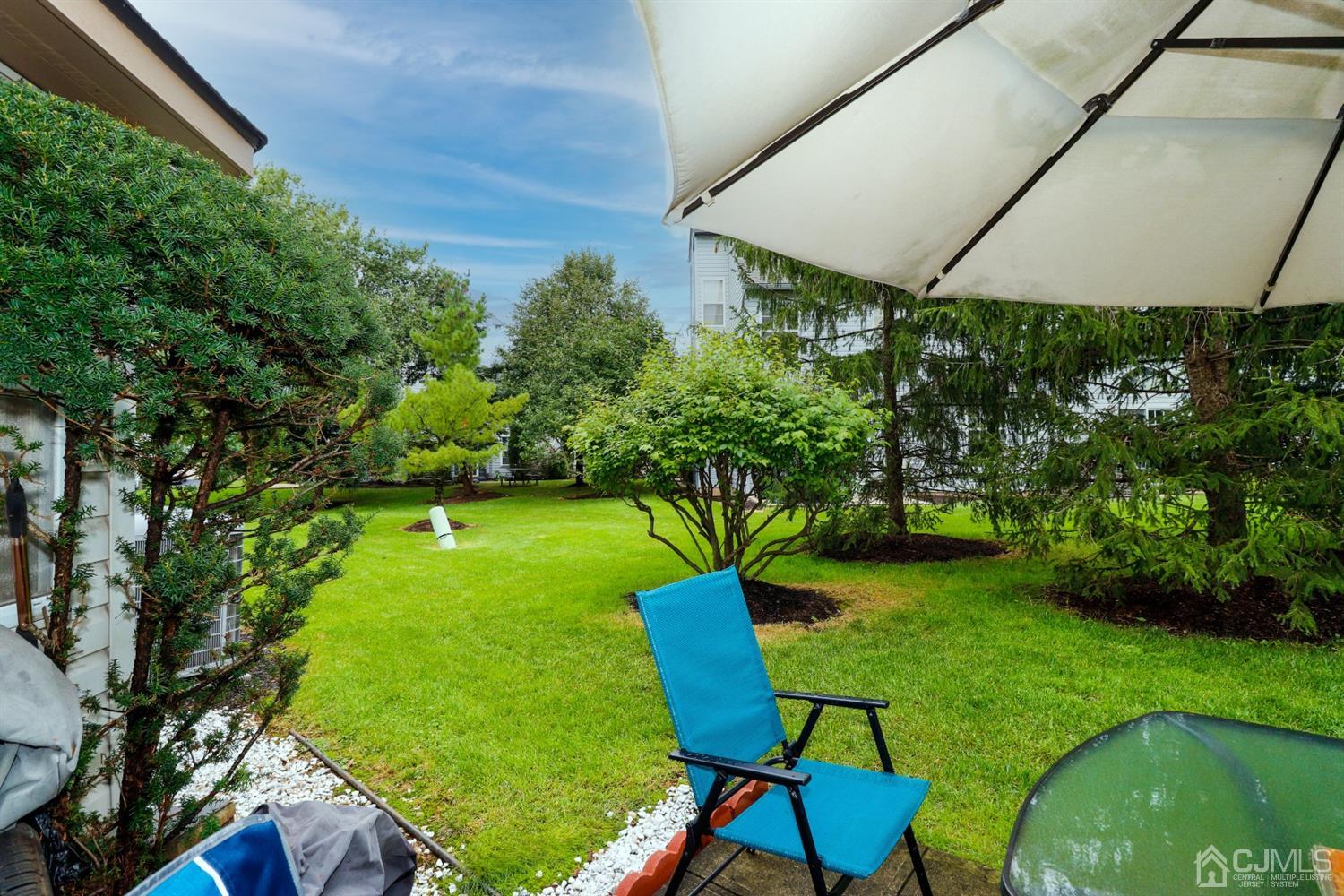 348 Lunar Road Piscataway, NJ 08854 - Photo 31 of 33 a view of an chairs and table in backyard