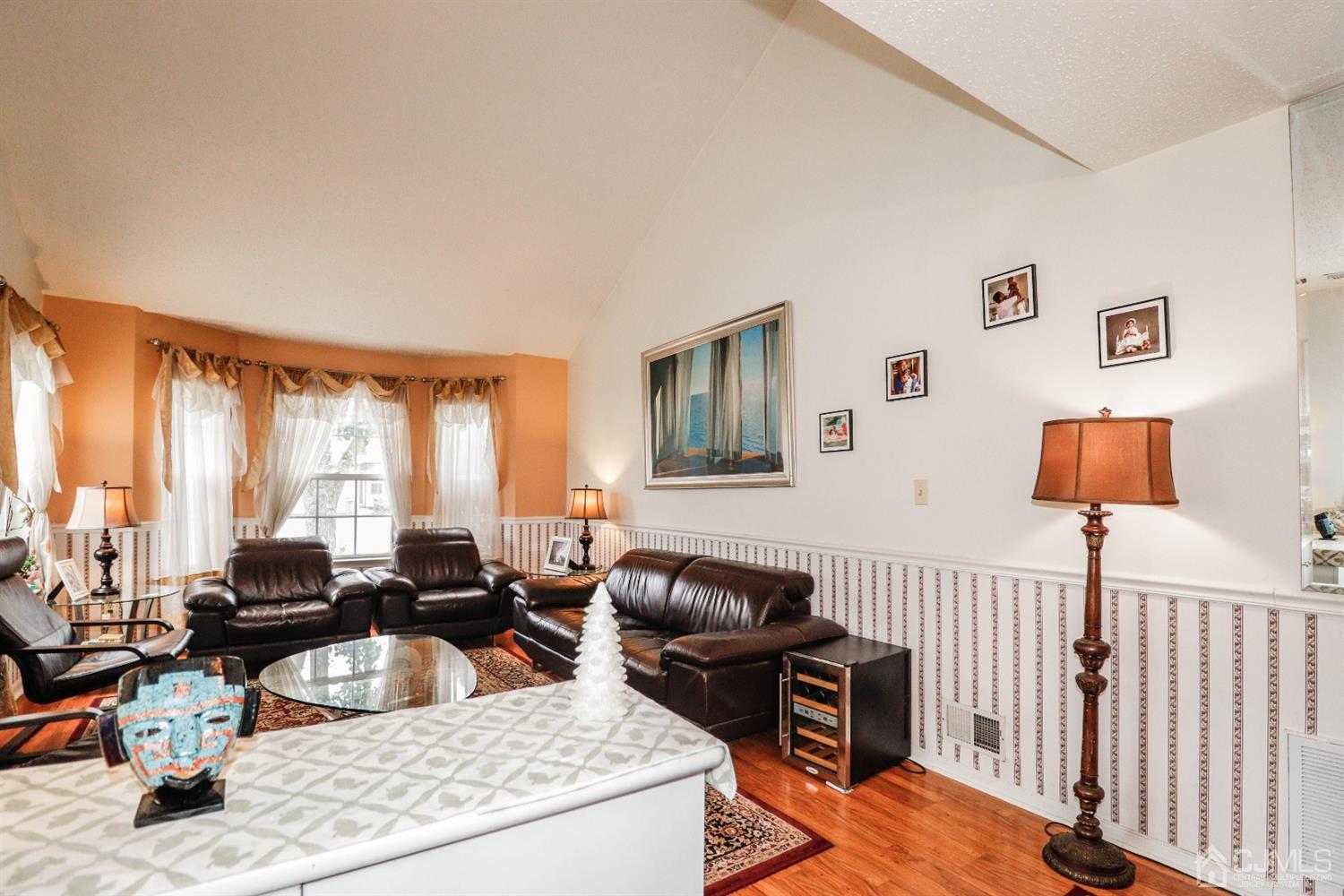 348 Lunar Road Piscataway, NJ 08854 - Photo 7 of 33 a living room with furniture a large window and a dining table
