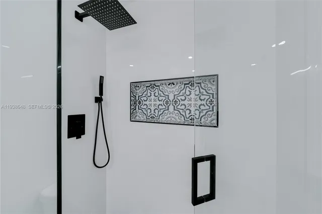 a view of a hallway with stairs