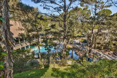 a view of a lake from a balcony