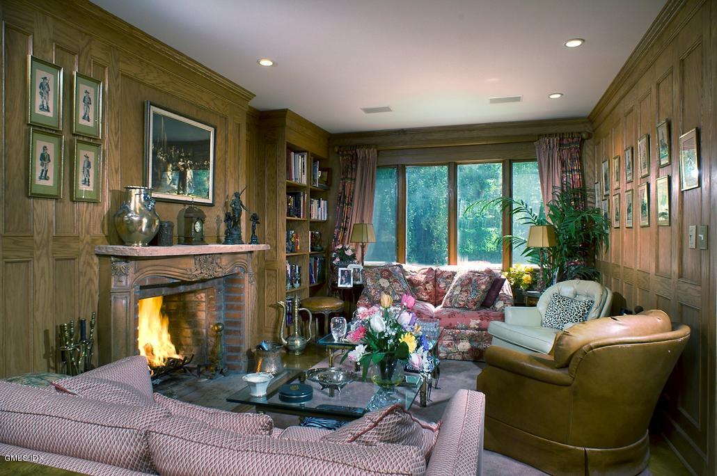 33 Twin Lakes Lane Riverside, CT 06878 - Photo 6 of 11 a living room with furniture and a fireplace