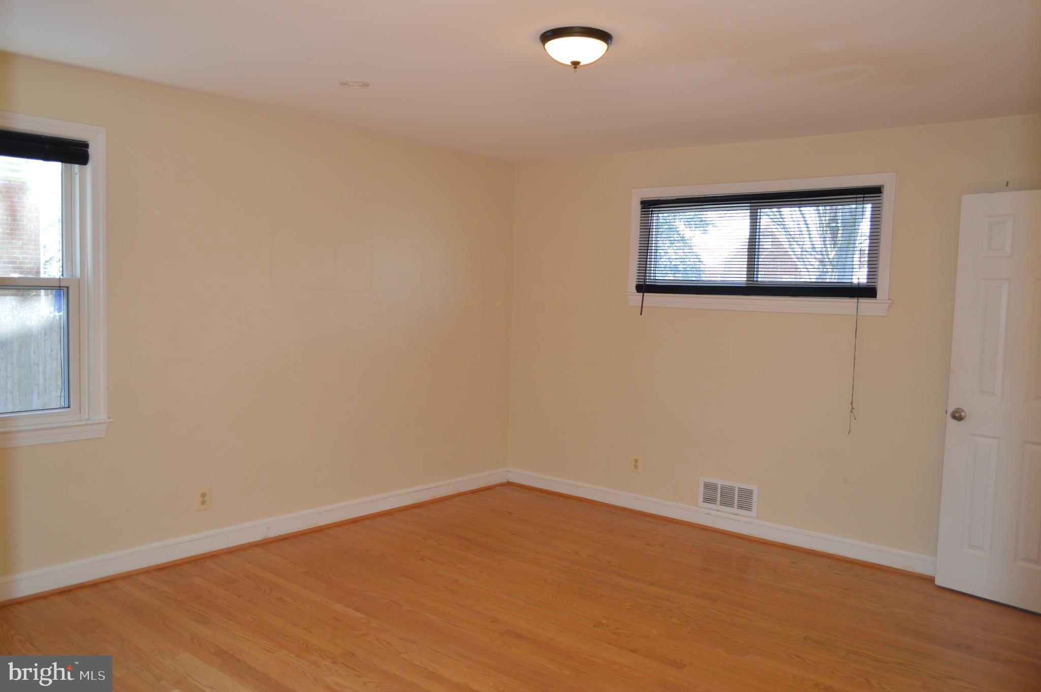10110 Portland Road Silver Spring, MD 20901 - Photo 14 of 39 Large primary bedroom with full bath