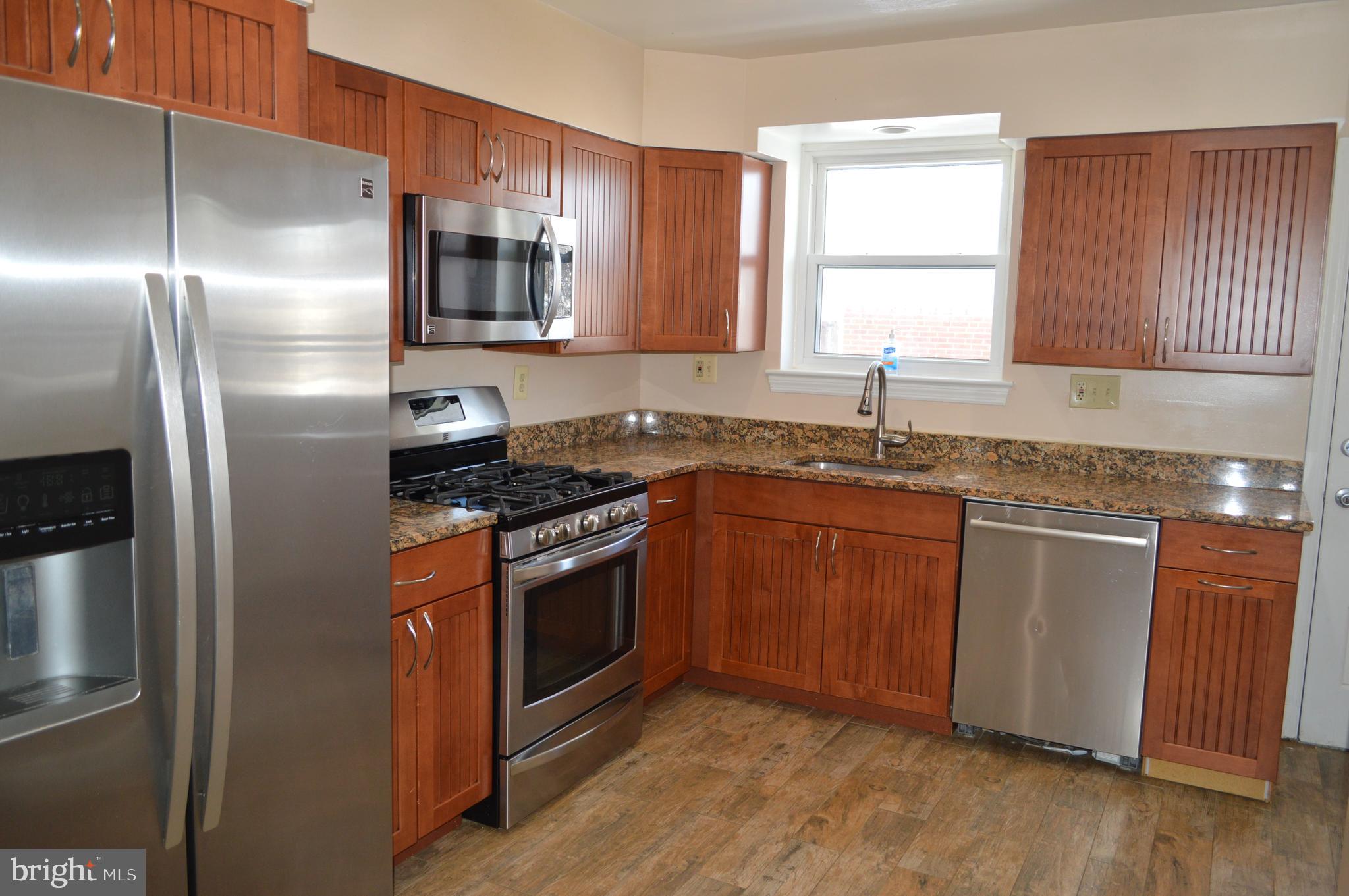 10110 Portland Road Silver Spring, MD 20901 - Photo 8 of 39 Stunning kitchen with stainless appliances