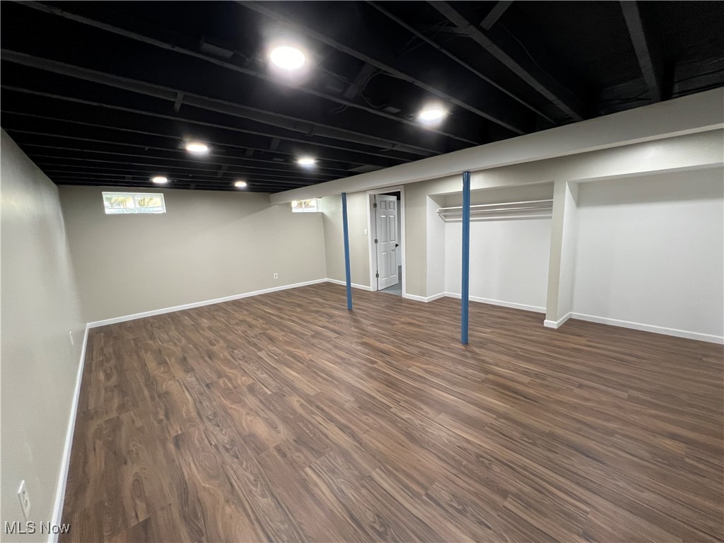 1715 Toepfer Road Akron, OH 44312 - Photo 34 of 49 Basement with dark hardwood / wood-style flooring