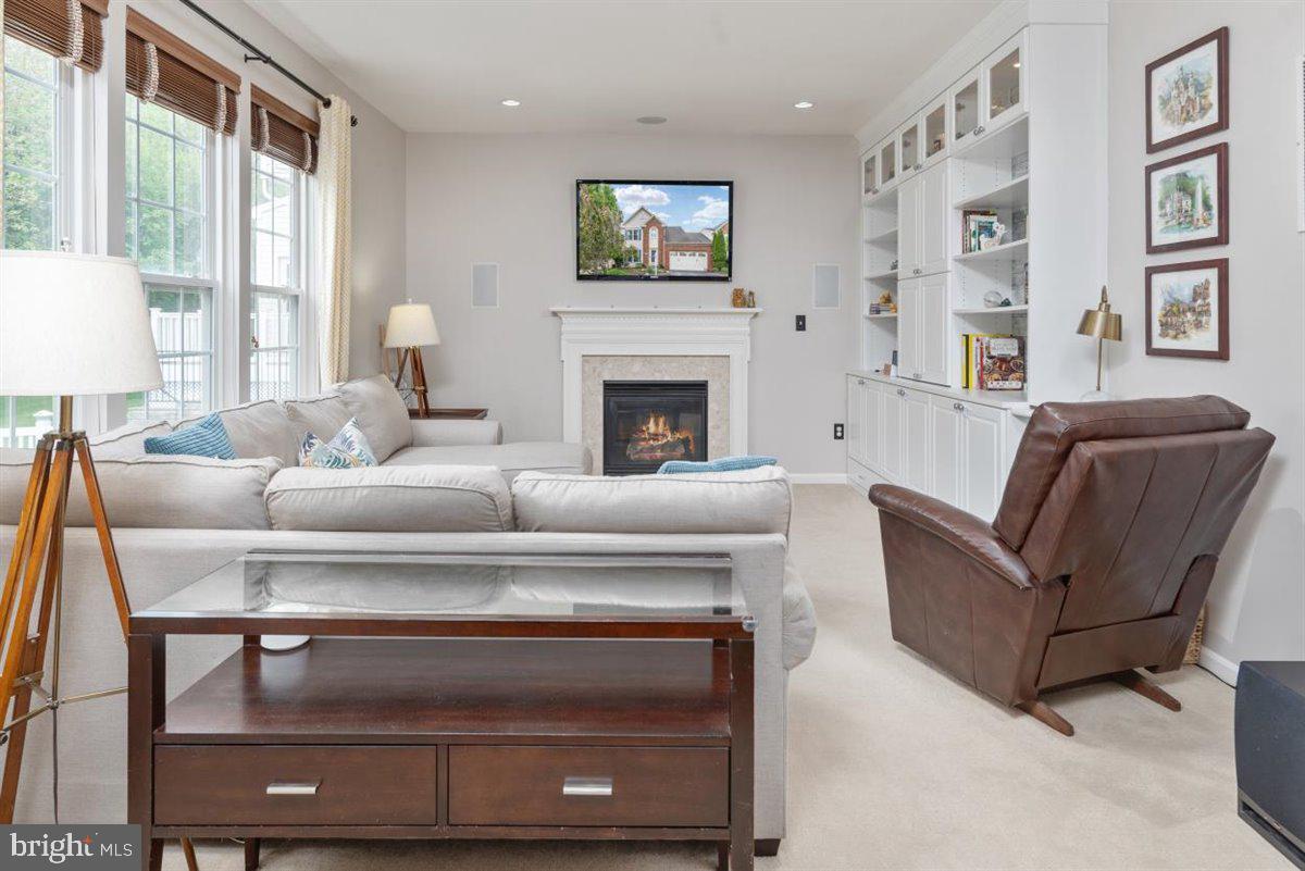 7813 Callington Way Hanover, MD 21076 - Photo 12 of 41 Gas fireplace and lots of windows!