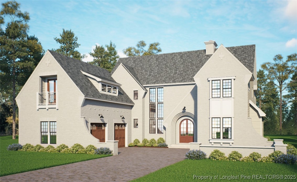 45 Beckett Ridge Pinehurst, NC 28374 - Photo 30 of 50 a front view of a house with a garden