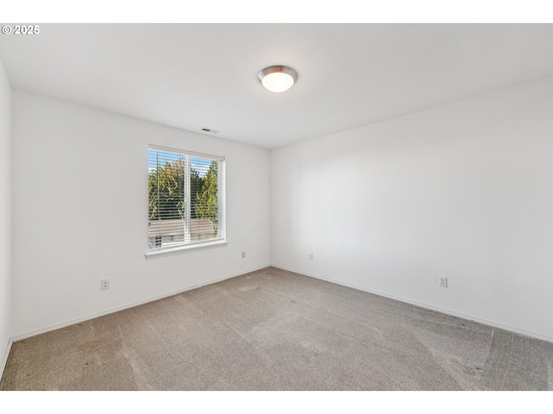 9 Curtis Lane Longview, WA 98632 - Photo 19 of 37 a view of an empty room with a window
